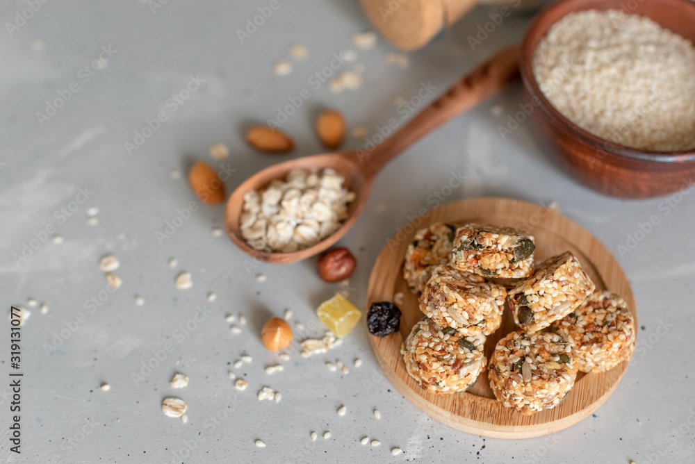 Raw vegan healthy dessert, date and nuts bliss balls, ingredients. Top view, space for text. Raw vegan healthy dessert, date and nuts bliss balls, ingredients. Top view, space for text.