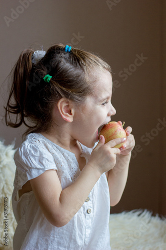 Funny little girl kid eats ...