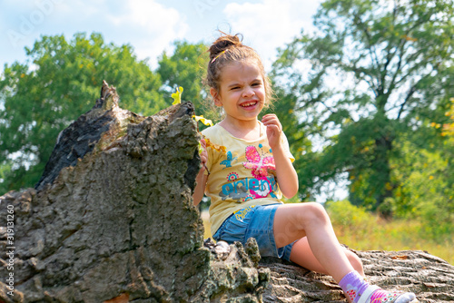Little girl having fun on t...