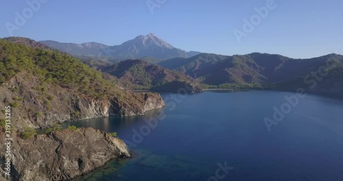 Wallpaper Mural Aerial view on the blue sea with high cliffs and mountains along the coast, 4k Torontodigital.ca