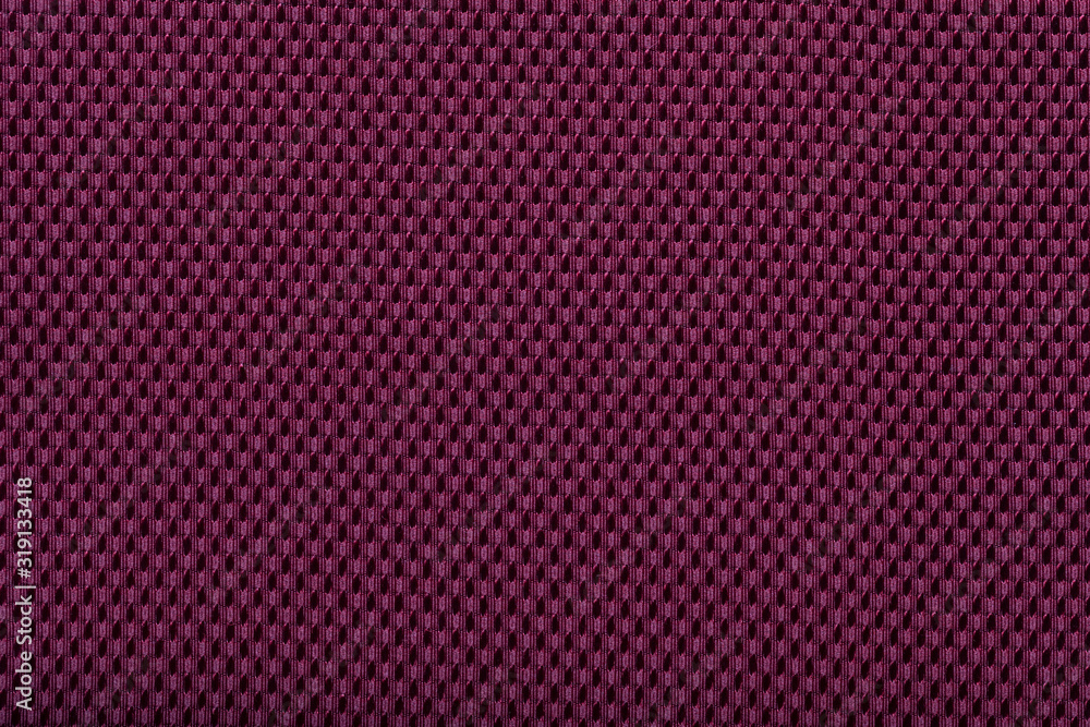 purple fabric with abstract pattern. red fiber texture polyester close-up