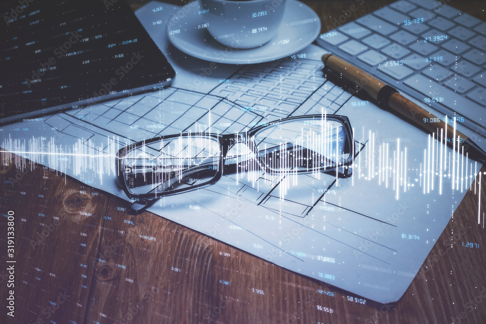 Financial chart hologram with glasses on the table background. Concept of business. Double exposure. Financial chart hologram with glasses on the table background. Concept of business. Double exposure.