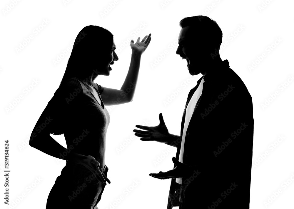 Silhouettes of couple quarreling on white background. Relationship problems