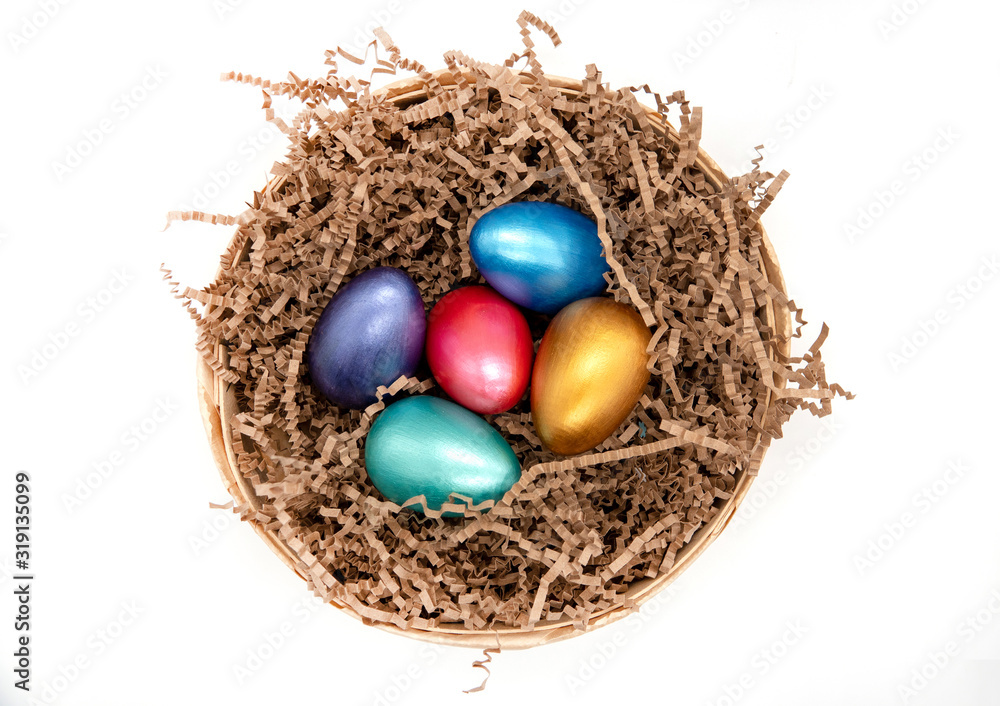 color easter eggs in basket isolated on white color easter eggs in basket isolated on white