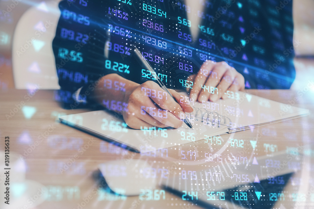Forex graph on hand taking notes background. Concept of research. Multi exposure