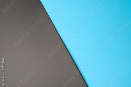 Black paper and light blue paper crossing for background color.