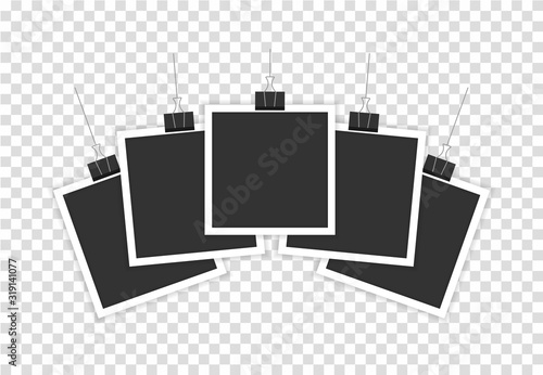 A realistic photo hanging on fortified is depicted in a transparent background.