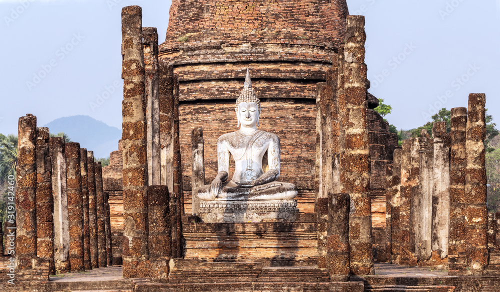 Ancient Buddha statue at sunrise in Ayutthaya, Thailand