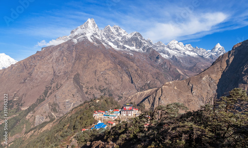 Delightful view of mountain valley with Tengboche Buddhist monastery in Himalaya mountains; trek to Everest base camp, Khumbu gorge, Solukhumbu, Nepal photo