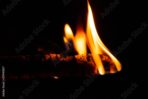 Fire on a piece of wood