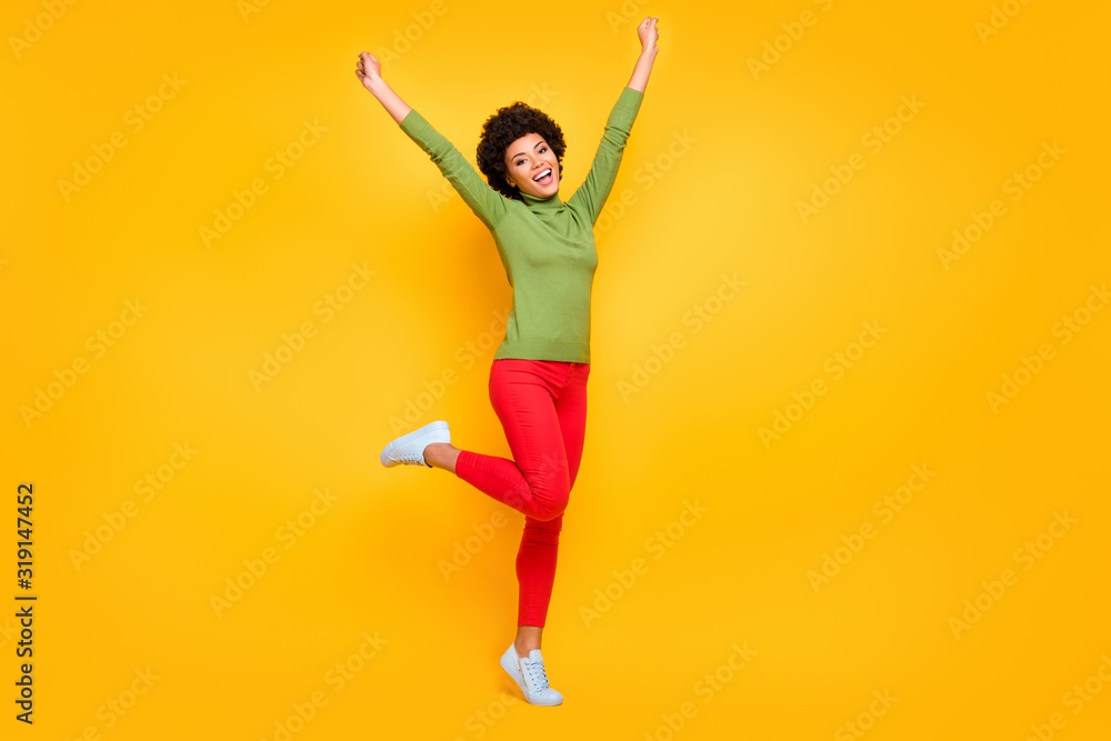 Full length body size view of her she nice attractive lovely teenage cheerful wavy-haired girl celebrating having fun free time isolated over bright vivid shine vibrant yellow color background Full length body size view of her she nice attractive lovely teenage cheerful wavy-haired girl celebrating having fun free time isolated over bright vivid shine vibrant yellow color background