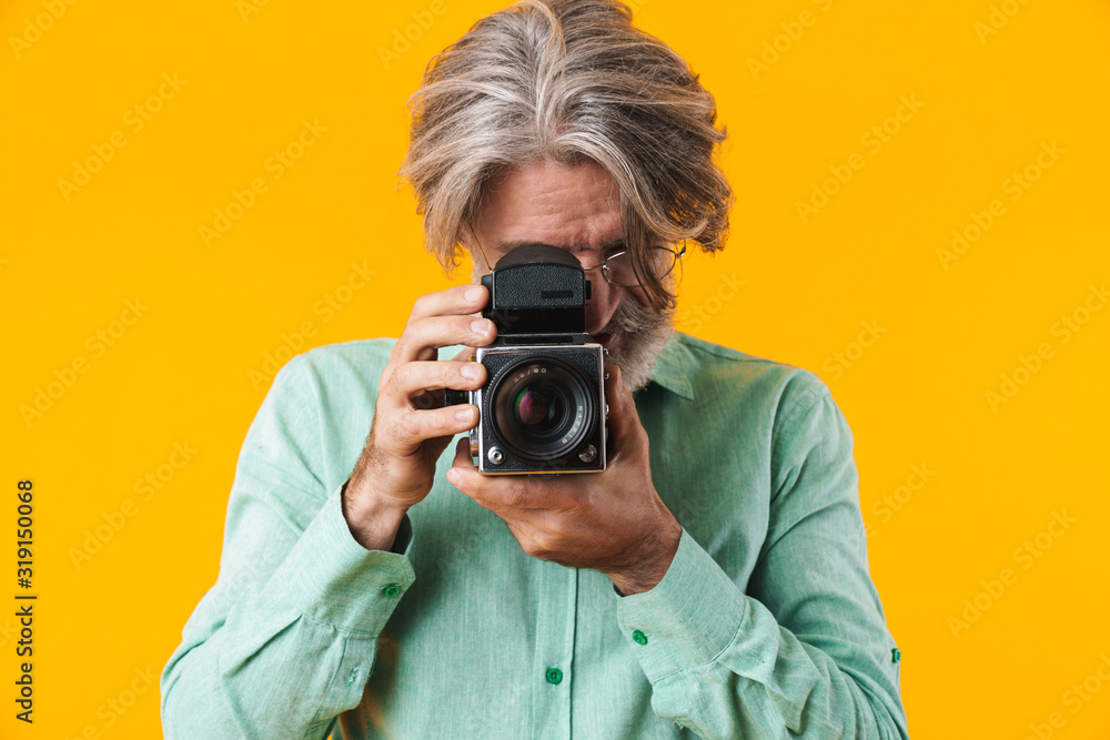 Man photographer posing isolated Man photographer posing isolated