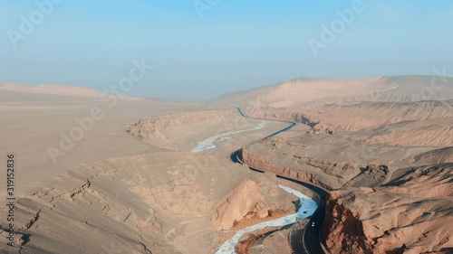 Aerial view of China Xinjiang Taklamakan Desert Aera Canyon in winter season.