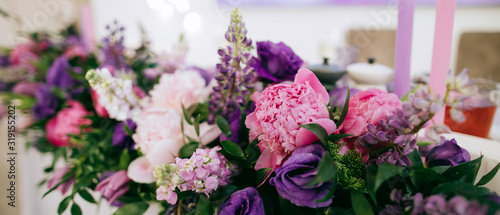 Decoration with purple and pink wedding flowers wedding reception