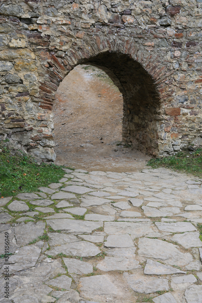 old pavement and gate in stonewall