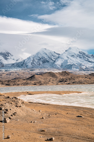 China Xinjiang Kashgar Karakuri frozen ice Lake in winter season. photo