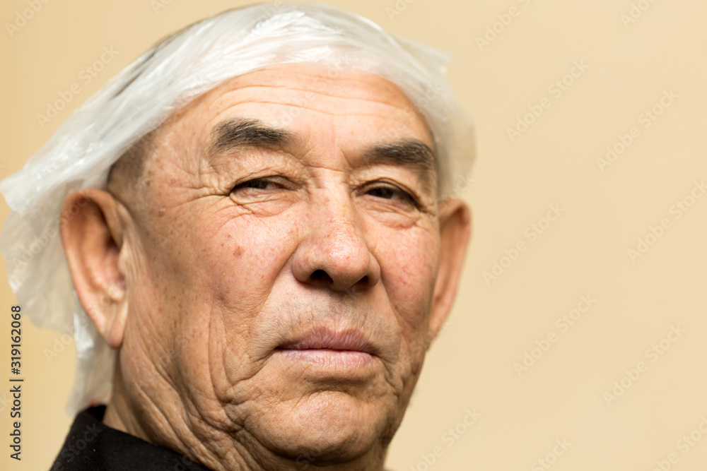 Portrait of an attractive man aged. photo after hair coloring Portrait of an attractive man aged. photo after hair coloring