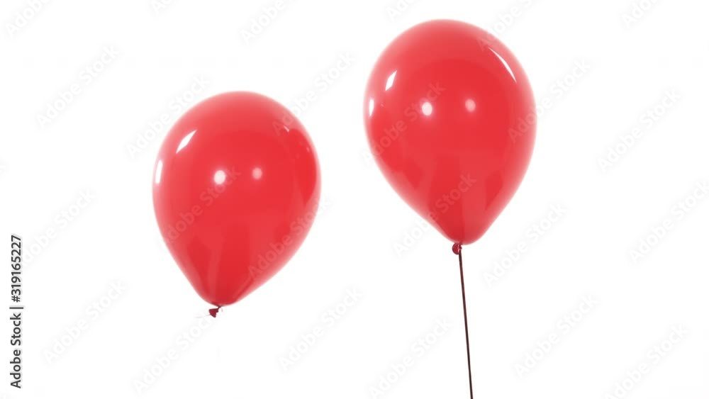 Two red flying balloons. Isolated, on white background. Two red flying balloons. Isolated, on white background.