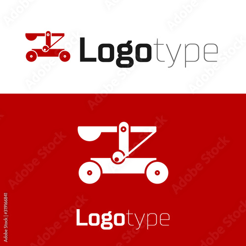 Red Old medieval wooden catapult shooting stones icon isolated on white background. Logo design template element. Vector Illustration
