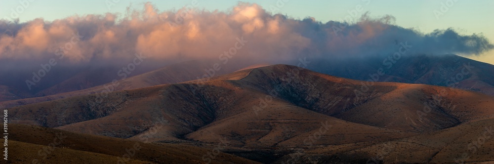 panorama of mountain and volcanic formations in the central part of Fuerteventura at sunrise