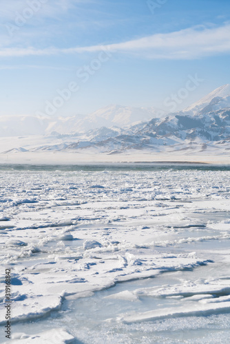China Xinjiang Sayram Lake(sailimu hu) in winter. Climate and travel concept. photo