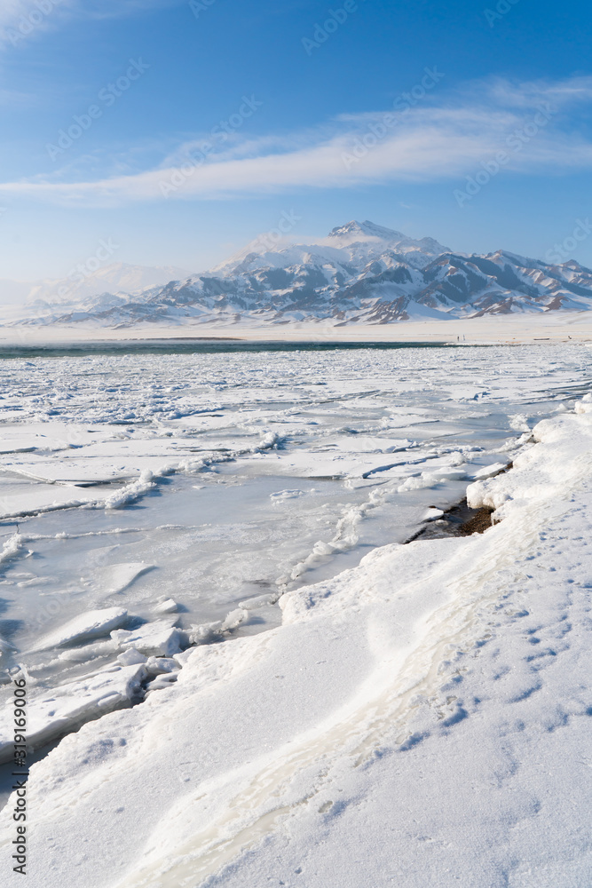 China Xinjiang Sayram Lake(sailimu hu) in winter. Climate and travel concept. China Xinjiang Sayram Lake(sailimu hu) in winter. Climate and travel concept.