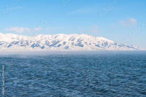Blue lake with peaceful wave loacted in Xinjiang China named Sayram(sailimu). Winter season.