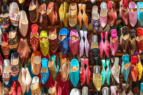 Multicolored traditional handmade shoes at the Moroccan oriental bazaar
