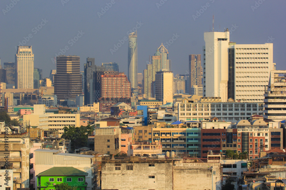 Fototapeta premium Smog over the Skyscrapers of Bangkok in the evening