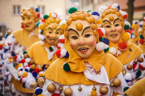 Festival participants dressed up in handmade costume and mask at the Ulmzug carnival event.