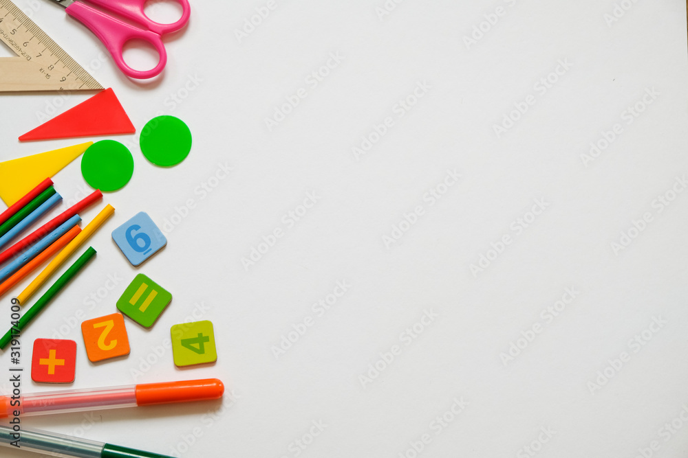 Fototapeta premium Math concept: colorful pens and pencils, number, calculating sticks in white background, copy space