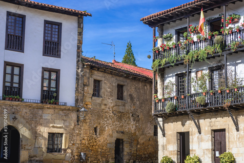 Fototapeta Naklejka Na Ścianę i Meble -  Old buildings on main square of historic part of Santillana del Mar in Cantabria region of Spain