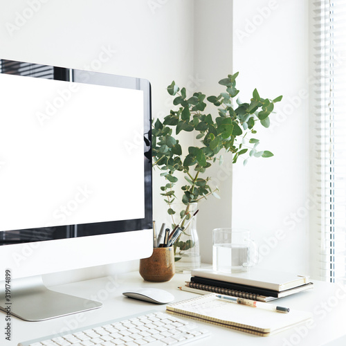 Cropped image of modern electronic devices, office accessories, keyboard  and fresh green plant on white desk of web developer. Business, creativity,  technology, workspace and gadgets concept Stock Photo | Adobe Stock