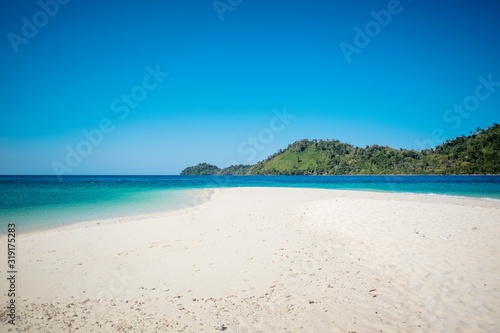 The beautiful view of Koh Khai (Egg Island), Satun, south of Thailand. White sandy beach, crystal clear water see the sand.