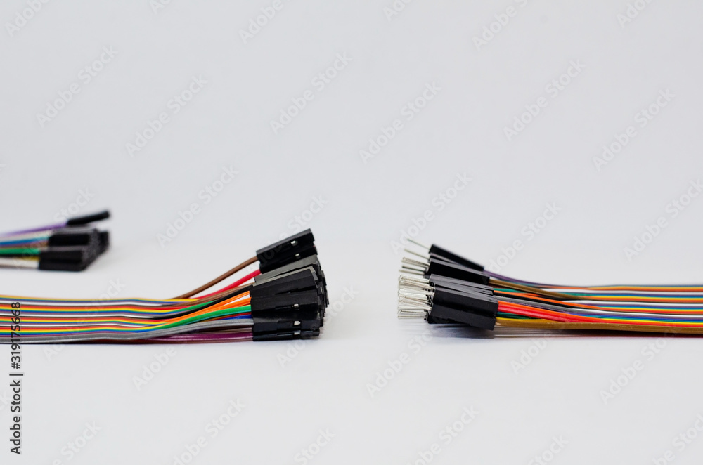 connection of colored wires on a white background connection of colored wires on a white background