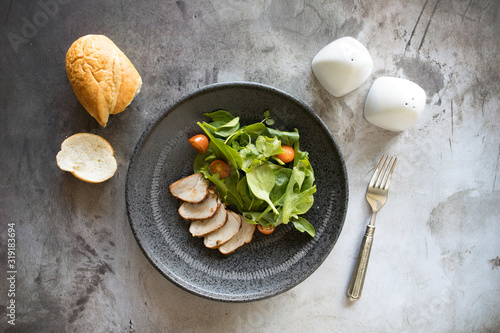 Slced Pork Tenderloin with a Green Salad photo