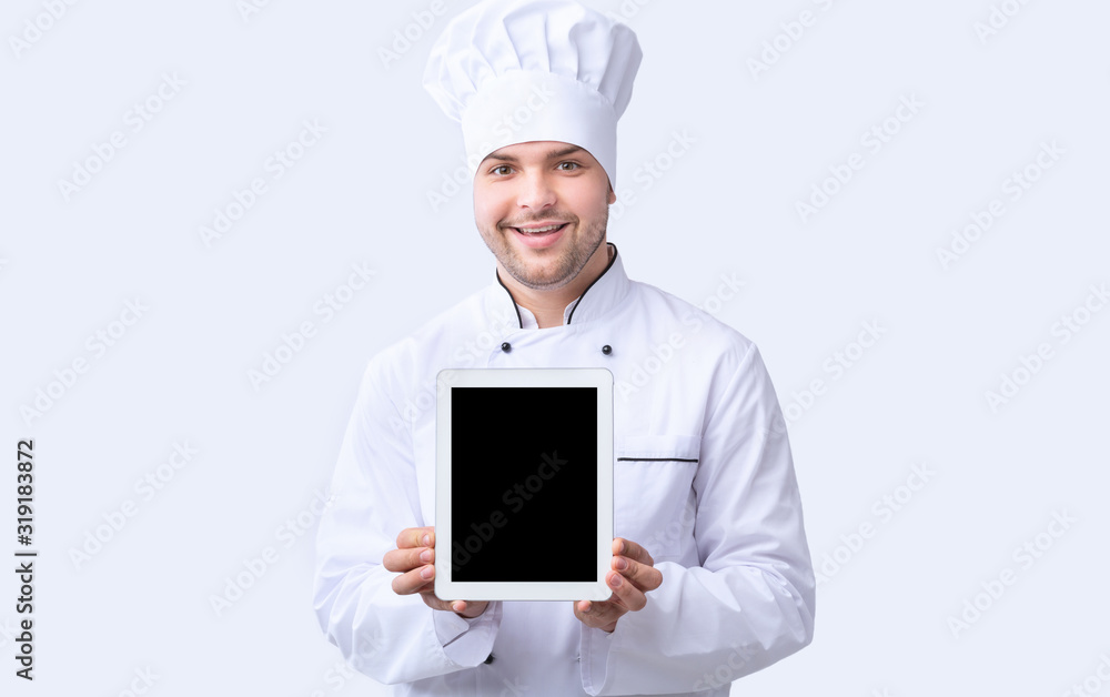 Chef Guy Showing Tablet Screen Standing Over White Background, Mockup Chef Guy Showing Tablet Screen Standing Over White Background, Mockup