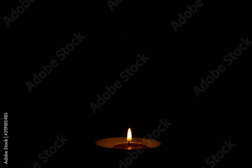 Abstract flame of a candle in the dark