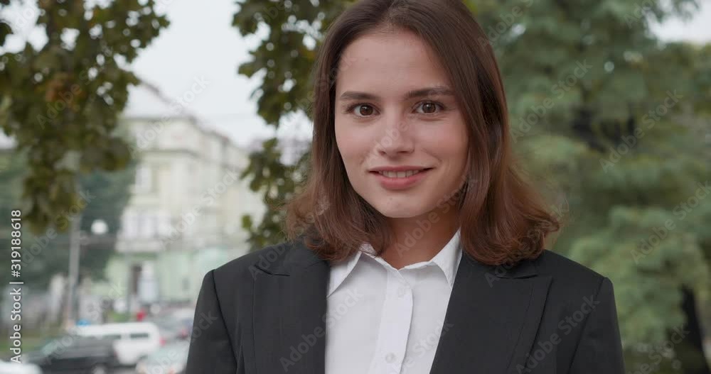 Beautiful Young woman with natural Beauty and charming Smile, Having Shirt Haircut. Attractive woman standing in front of Camera, touching her Hair. Having Gorgeous and nice Appearance. Beautiful Young woman with natural Beauty and charming Smile, Having Shirt Haircut. Attractive woman standing in front of Camera, touching her Hair. Having Gorgeous and nice Appearance.