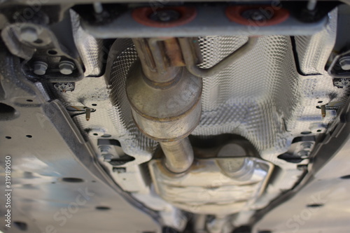 Catalytic converter of a modern car bottom view.
