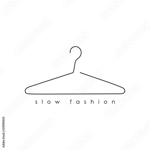 Minimalistic line hanger with inscription slow fashion. Design for posters, T-shirts, banners. Vector illustration.