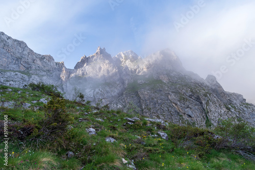 Fog revealing the mountain range, Ligurian Alps, northwestern Italy