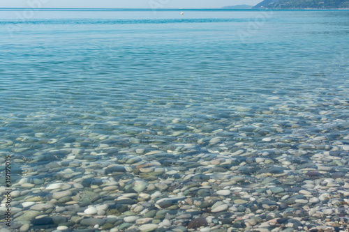 Clear seawater with a visible rocky seabed