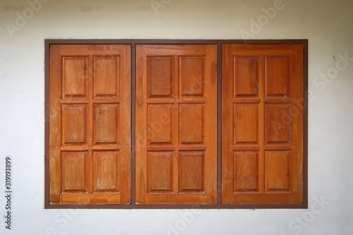 wooden window closed on white wall residential house