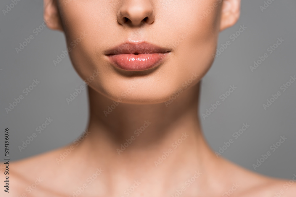 cropped view of girl with perfect skin, isolated on grey