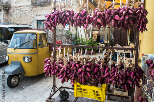 Photography Italian street market of red onions in Calabria, Italy