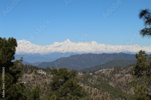 Green Hills along with Snow Mountains