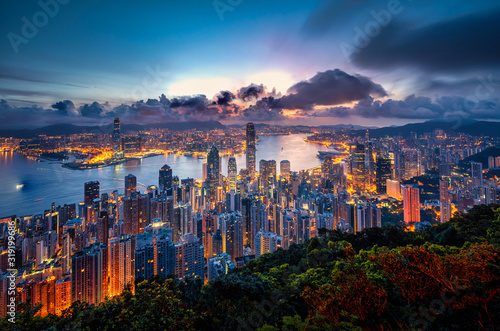 Hong Kong city skyline at sunrise view from Peak mountain. © nuttawutnuy