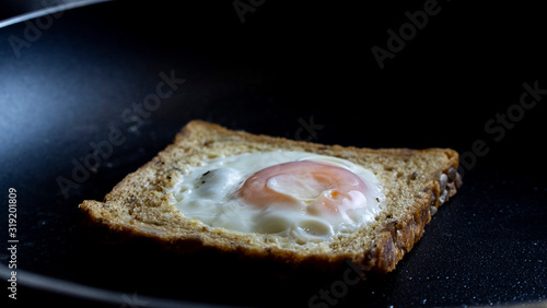 French Toast With An Egg Inside In A Pan. Traditional French Dish Croque-Madame