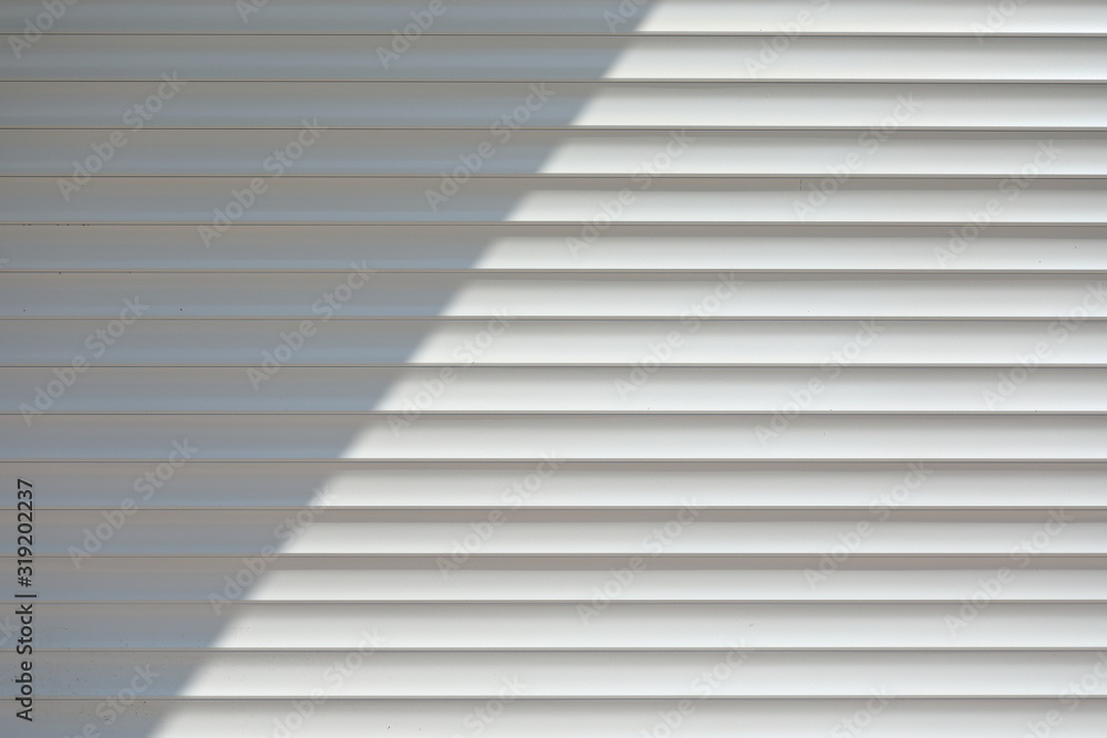 white roller shutter door closed security in modern house white roller shutter door closed security in modern house